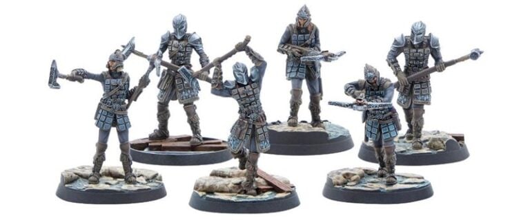 Six detailed miniature warriors from the Dawnguard, dressed in fantasy armor with weapons like axes, swords, and spears. They stand on textured bases resembling rocky terrain, capturing the essence of the Vampire Hunters' readiness for battle inspired by the Elder Scrolls universe.