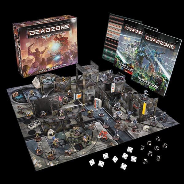 The board game setup for Mantic's "Deadzone" Starter Set features a detailed game board with miniature figures, dice, and two rulebooks. The game box is displayed in the background, showcasing dynamic artwork.