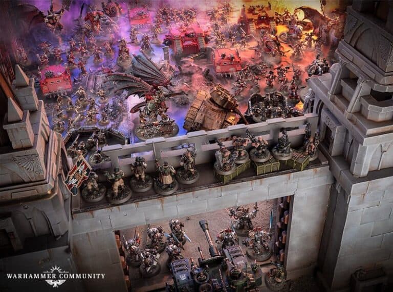 In a dramatic Warhammer 40k battle scene, armies clash in a vivid boarding action. Soldiers and dragon-like creatures engage on a detailed fortress, with vibrant colors and smoke enhancing the intense atmosphere crafted by Games Workshop.