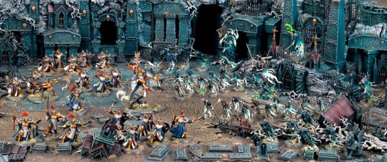 A detailed tabletop miniature battlefield scene with two opposing armies from Soul Wars. On the left, brightly colored figures in vibrant uniforms wield weapons. On the right, ghostly spectral figures emerge from a gothic, eerie, and crumbling fortress. The terrain is scattered with debris and grave markers.
