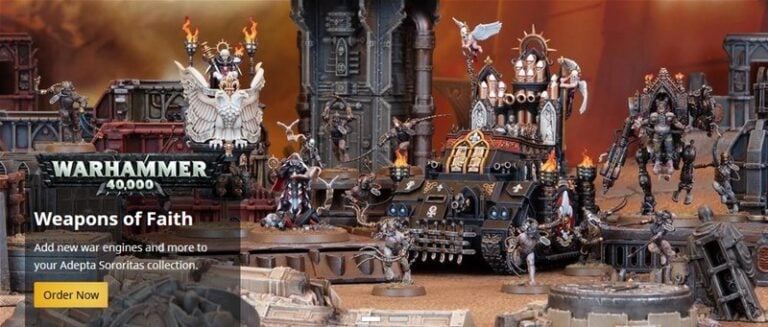 A dramatic scene featuring detailed "Warhammer 40,000" miniatures from Games Workshop. A central tank-like vehicle is surrounded by armored Sisters of Battle in a fierce battlefield setting. Flames and debris are visible. Text reads: "Weapons of Faith. Pre-order now.