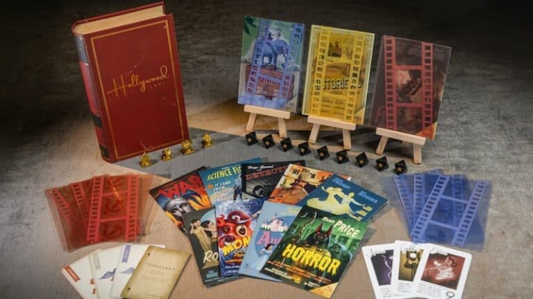 The board game set, "Hollywood," evokes the golden age of films, featuring movie-themed cards and three colored board sections on easels. With dice and gold tokens adorning a textured surface, it feels like Hollywood 1947. Vibrant posters and cinematic nostalgia make every Kickstarter fan eager to play.