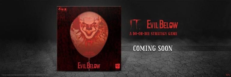 The image showcases the board game box for "IT: Evil Below" by USAopoly, featuring a clown face on a red balloon. The text reads "A Do-or-Die Strategy Game. Coming Soon." The background is dark with a cracked ground texture, setting an eerie tone for this thrilling experience.
