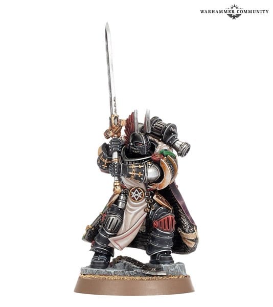 A highly detailed miniature figure of Corswain, from the Horus Heresy series, features a futuristic armored warrior holding a large sword. The ornate black armor has red and gold accents. The figure stands on a textured base and wears a helmet with a crest, exemplifying Games Workshop's craftsmanship.