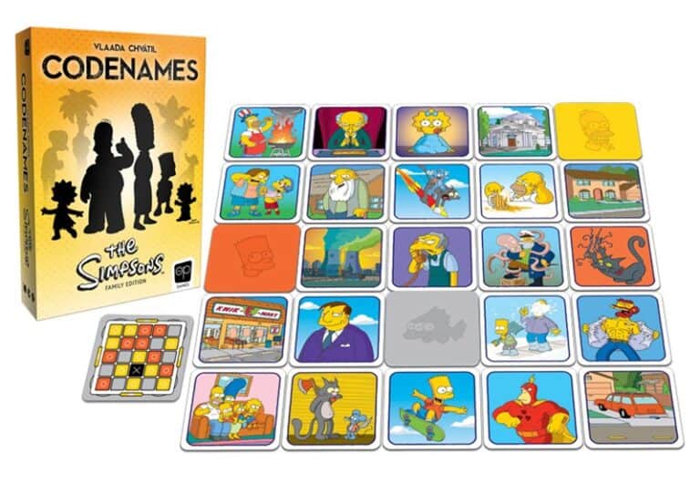 The image showcases "Codenames: The Simpsons Family Edition," crafted by USAopoly. It features the game box on the left, while on the right, a grid of illustrated cards displays beloved characters and scenes from "The Simpsons.