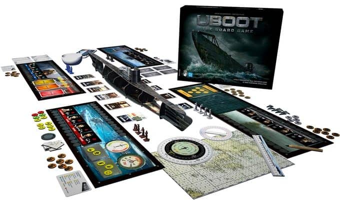 A Kickstarter special, the board game setup features a submarine model, cards, tokens, maps, and a neatly labeled box: "UBOOT: The Board Game." All elements are artfully arranged on a pristine white surface.