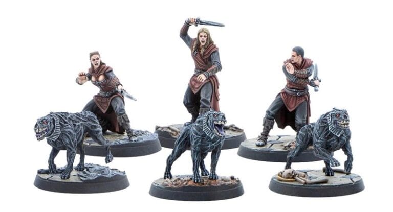Miniature figurines of three warriors in dynamic poses, inspired by The Elder Scrolls' Call to Arms game, each wielding weapons. They are flanked by armored wolf-like creatures on circular bases, all set against a neutral backdrop.