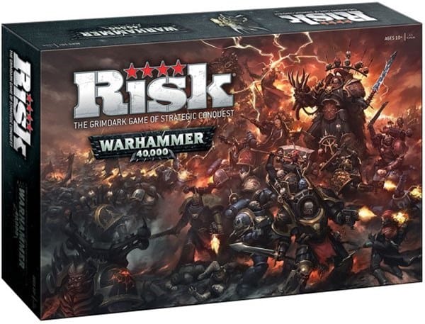 The box cover of "40k Risk" by OP Games showcases a dynamic battle scene with armored warriors and fiery explosions. The title stands out with a dark, intense color scheme, announcing a theme of strategic conquest in the Warhammer 40,000 universe.
