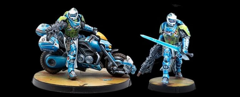 Two futuristic armored figures stand on a base. One leans on a blue motorcycle, while the other holds a glowing blue sword. Both wear blue and green suits with helmets, set against a dark background. They embody the spirit of Infinity, echoing the legendary Knight of Montesa from Corvus Belli.