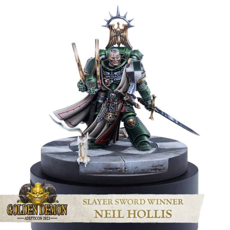 A detailed miniature figure of a warrior in armor, holding a sword and staff, stands triumphantly on a decorative base inscribed with "Slayer Sword Winner Neil Hollis Golden Demon Adepticon 2023." A small animal perches at the warrior's feet.