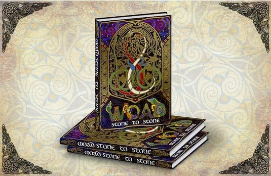 The illustrated book cover showcases ornate Celtic designs with intertwined patterns in gold, red, and blue, reminiscent of Welsh mythology. The title "Wood, Stone to Stone" stands out boldly against a Celtic motif background. Three copies are displayed, inviting exploration of its rich tales.