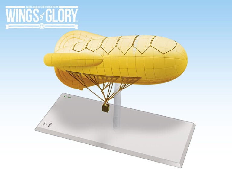 A model of a yellow airship displayed on a white rectangular base evokes the early 20th-century designs. Featuring "WW1 Wings of Glory" by Ares Games, it captures the era's spirit with "Wings of Glory" inscribed in the top left corner against a gradient blue background.