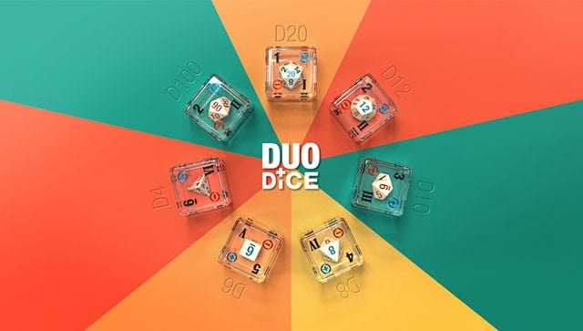 A vibrant flat lay showcases six DUO DiCE at the center, perfect for tabletop gaming enthusiasts. Each die displays two numbers on opposing sides, framed by orange, teal, and green segments. The bold text "DUO DiCE" stands out proudly in the middle, hinting at its upcoming Indiegogo launch.