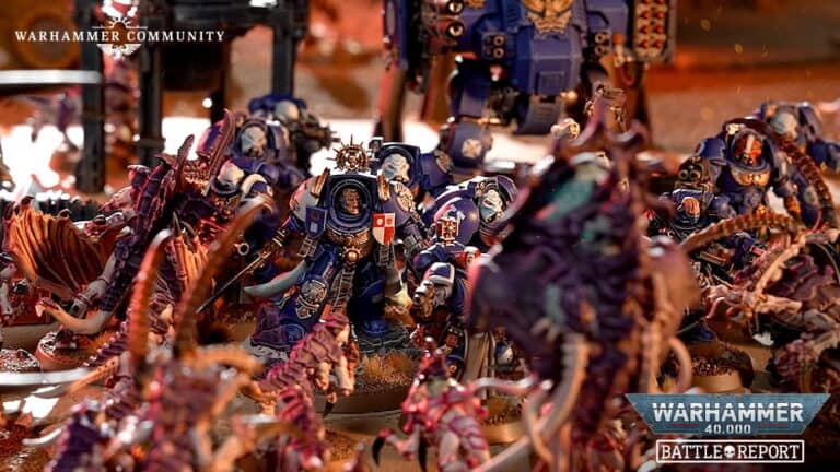 A Warhammer 40,000 battle scene with detailed miniatures unfolds in this dynamic diorama. Space Marines in blue armor face off against alien creatures, showcasing the new edition's intricate setting, varied poses, and vivid colors—exceptional for crafting an epic battle report.