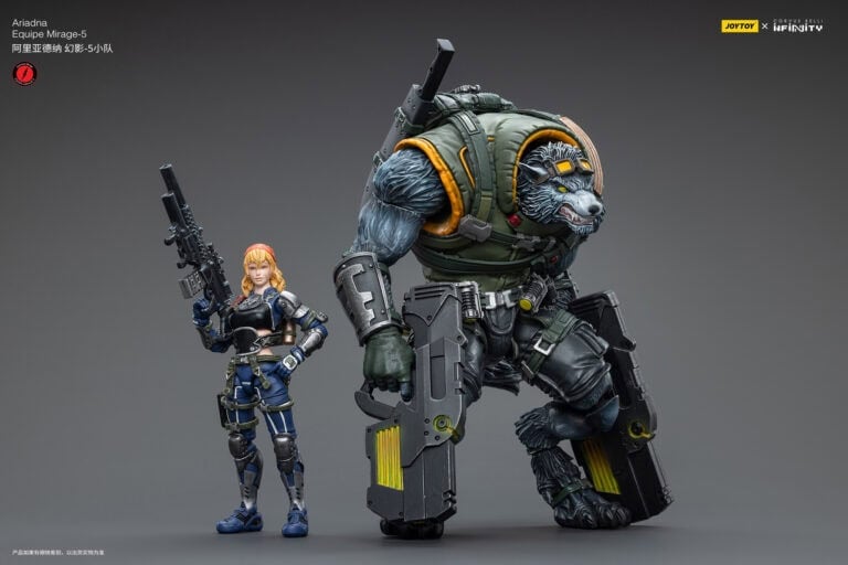 A small female warrior in futuristic armor confidently stands next to a large, armored, humanoid bear-like figure from the Corvus Belli Infinity Figures collection. Both hold rifles, with the bear-like companion in green armor featuring JoyToy’s signature yellow accents against a gray gradient backdrop.
