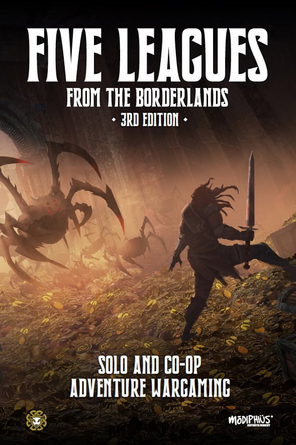 A warrior brandishes a sword, facing giant spider-like creatures in a cavern surrounded by gold coins. The text reads "Five Leagues From the Borderlands, 3rd Edition" from Modiphius Entertainment, offering thrilling solo and co-op adventure wargaming.