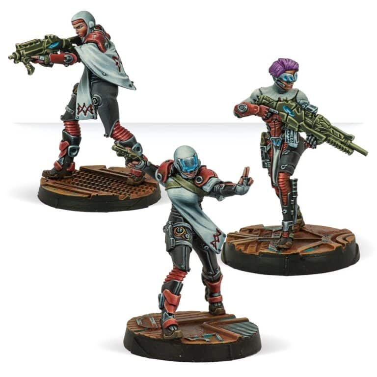 Three detailed sci-fi miniatures in dynamic poses, featuring futuristic soldiers from the Infinity universe. Two wear capes and hold guns, while one, with vibrant purple hair, wields a large rifle. These Corvus Belli figures stand ready as reinforcements on industrial-themed bases.