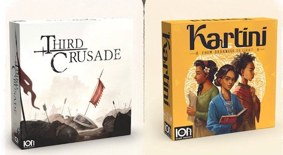 Two board games on display from Ion Game Design: "Third Crusade," showcasing a medieval battle scene, and "Kartini," featuring an illustration of women in traditional clothing. Both boxes stand upright against a plain background.