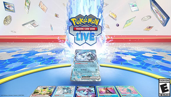 Promotional image for Pokémon TCG Live, featuring Scarlet & Violet cards with a holographic centerpiece. Cards are digitally enhanced against a blue and white energy burst backdrop. Experience the Paldea Evolved expansion! ESRB rating: Everyone.