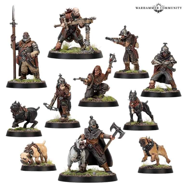 This collection of intricately painted miniature figures from Games Workshop showcases Warhammer warriors in dark robes with weapons and armored dogs on green and brown bases, evoking a vivid Battlefront scene against a pristine white background.