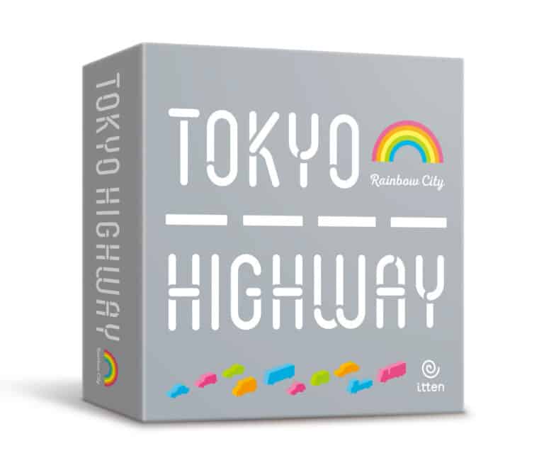 The image displays the box for the "Tokyo Highway" board game by itten. The gray box with white text showcases playful illustrations of a rainbow and colorful cars, reminiscent of Rainbow City's vibrant streets, promising endless fun and creativity.