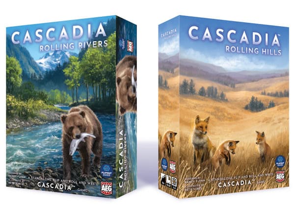 Two board game boxes are shown. The left box, "Cascadia: Rolling Rivers," features a bear with a fish in a river, while the right box, "Cascadia: Rolling Hills," depicts a family of foxes in a hilly landscape. These games offer puzzly adventures emblematic of their successful Kickstarter origins.