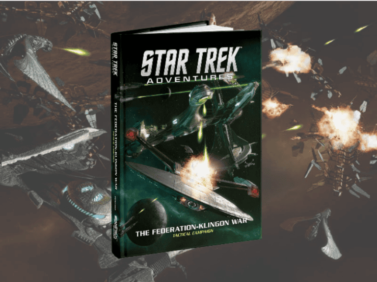 A "Star Trek Adventures" book titled "The Federation-Klingon War" by Modiphius Entertainment is displayed. The cover features a space battle with starships and explosions against a dark cosmic backdrop, capturing the essence of this epic interstellar conflict.