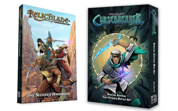 Two tabletop role-playing game boxes are displayed. The left box, "Relicblade: The Seeker's Handbook," features adventurers in a desert terrain. The right box, from the Kickstarter series "Cursebreakers: Special Edition," shows a character wielding a glowing sword.