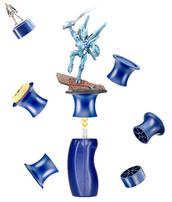 A blue action figure with swords stands on a detailed base atop a blue pod, reminiscent of the innovative design from a Kickstarter Campaign. Around it, various pod components with different tops and caps seem to assemble or disassemble around the central figure.