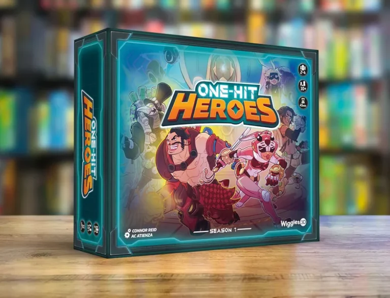 The box of the board game "One-Hit Heroes," launched with Kickstarter funding, showcases colorful cartoon characters in action poses, including a muscular figure and a masked character. The background reveals a blurred bookshelf, capturing the excitement of this co-op card game adventure.