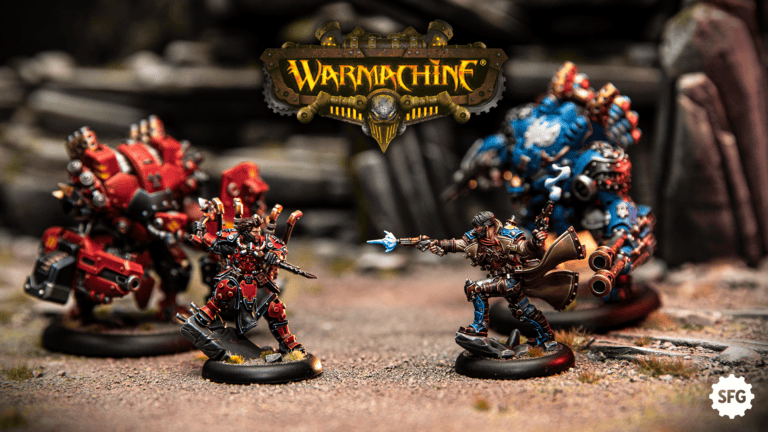 Two intricately designed action figures are poised for battle on a rocky terrain. One figure wields a glowing spear, while the other holds a large sword. Mechanical suits accompany them in this Iron Kingdoms scene. The logo "WARMACHINE" is displayed above, embodying the Steamforged universe.
