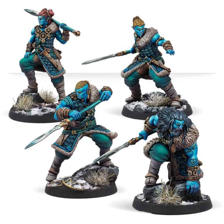 Four intricately painted blue-skinned miniature warriors in Viking-style attire, armed with spears and wearing fur-lined armor, posed on snowy and rocky terrain bases—part of the exclusive October Releases from Corvus Belli's Infinity line.