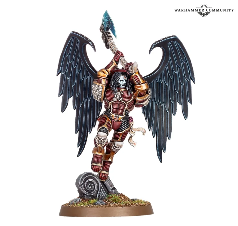 A detailed miniature of a winged warrior from the Warhammer universe, crafted by Games Workshop, exudes Blood Angels pride. Clad in red and gold armor with imposing black wings, it wields a mystical weapon aloft. The figure stands majestically on a round base adorned with sculpted terrain elements.