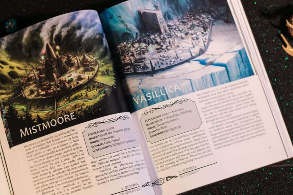 An open book reveals two enchanting pages from the Tenebris Realm, crafted by Gabrielle Baker for TTRPG enthusiasts. The left features "Mistmoore," a dark castle shrouded in mystery, while the right showcases "Vasillica," a snowy cityscape. Both pages offer vivid descriptions and illustrations.